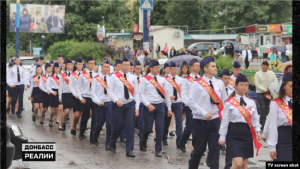 Kyrylo at the graduation ceremony in occupied Luhansk. Photo: screenshot ~
