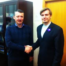 Yuri Kofner (right) shakes hands with Igor Girkin, the Russian FSB officer who, in his own words, “pulled the trigger of war” in eastern Ukraine. This photo can still be found online despite having been deleted from Kofner’s FB page ~