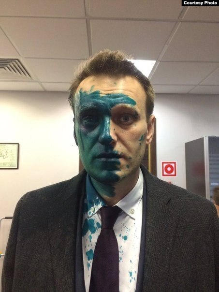 Russian opposition leader Alexei Navalny dowsed in the brilliant green dye in 2017. Photo via RFE/RL ~