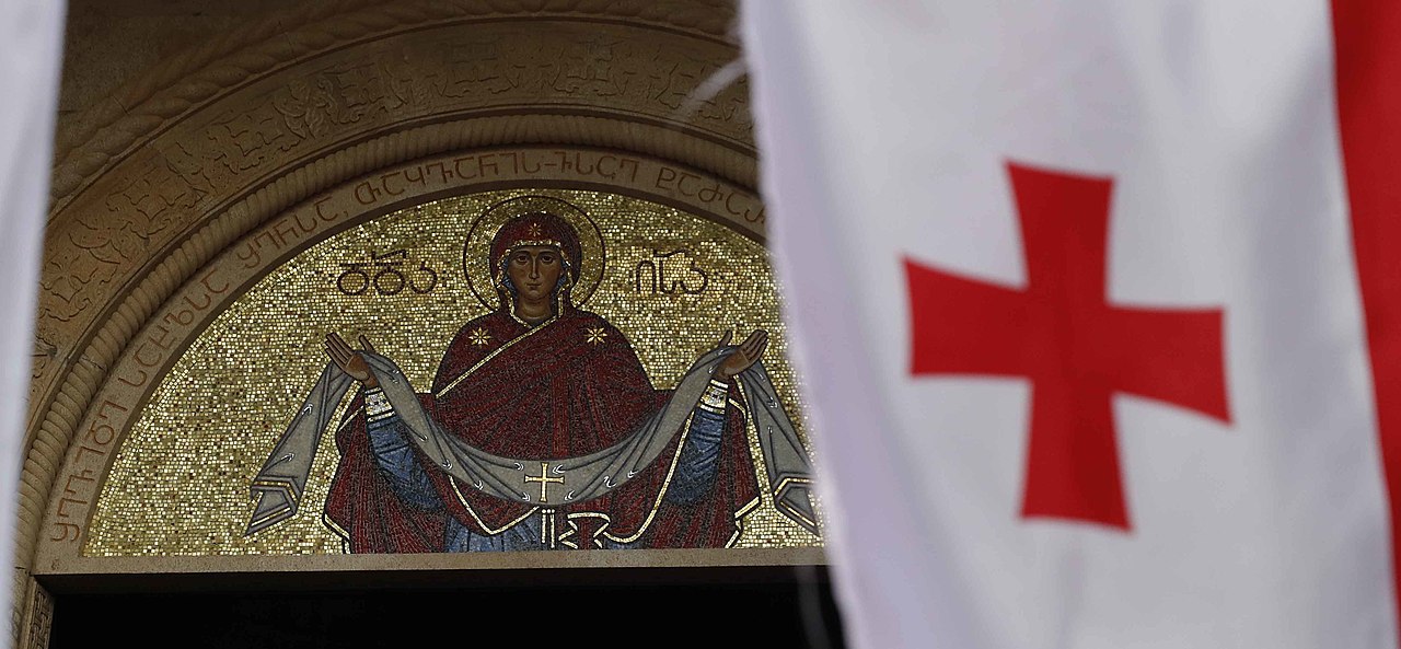 Gold mosaic of the Holy Mother at the Cathedral of the Holy Mother of Iberia of Zugdidi, Georgia. Photo by Giorgi Abdaladze, Communications Department of the Administration of the President of Georgia, via Wikimedia.