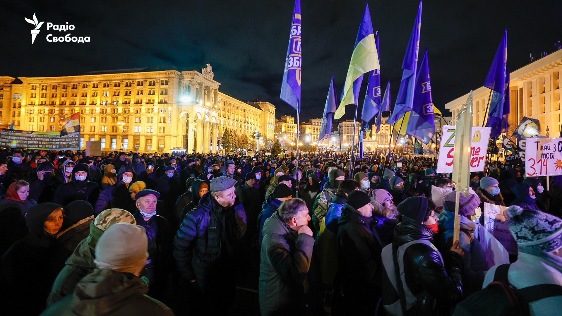 On 1 December 2021, thousands of protesters flooded central Kyiv, demanding the resignation of senior officials accused of being behind the failed Ukrainian intelligence operation to arrest Wagner mercenaries, and announced a termless campaign for Zelenskyy’s resignation. Photo: RFE/RL ~