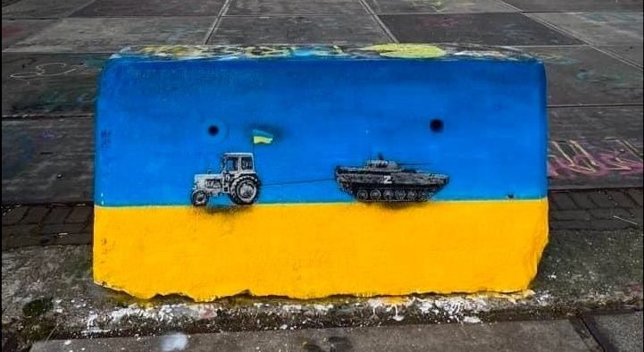 A Ukrainian farmer's tractor pulling a defeated Russian tank marked with a "Z" (mural). Author and location unknown. Source: Dattalion