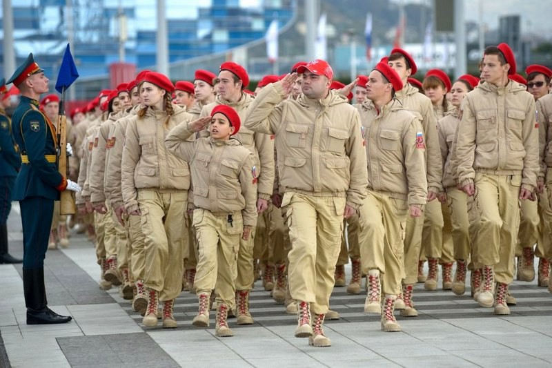 Local troops of Putin’s Youth Army on parade in the city of Sochi, 2017. This analog to Nazi Germany's Hitler Youth and its female equivalent, the League of German Girls, was founded by the Russian Defense Ministry in 2016. It takes Russian children from 8 to 18 years old, indoctrinates with Putinist ideology and teaches them military weapons and tactics. Photo: privetsochi.ru