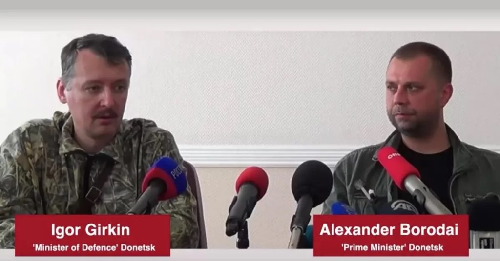 Russian nationals Igor Girkin (aka "Strelkov") as "DNR defense minister" and Alexandr Borodai as "DNR prime minister" in summer 2014 during the initial invasion of Ukraine. Screenshot and captions by ukranews.com