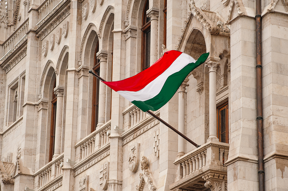 Hungary flag on Parliament building in Budapest