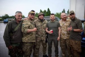 Zelenskyy and Ukrainian soldiers