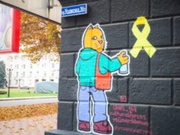 Yellow Ribbon graffiti cat Ukraine resistance