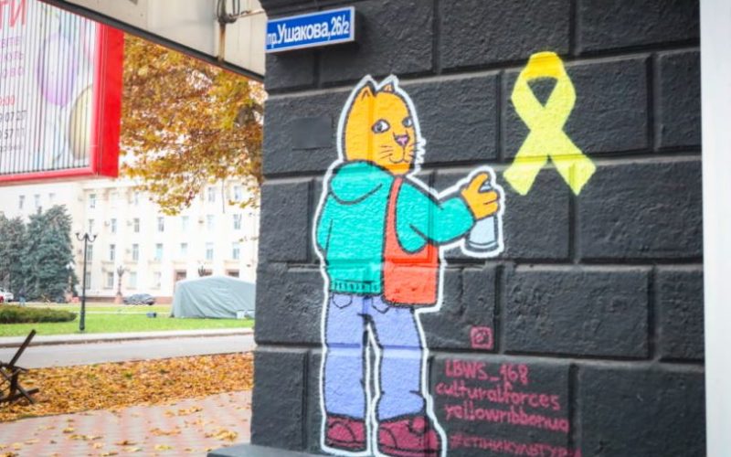 Yellow Ribbon graffiti cat Ukraine resistance