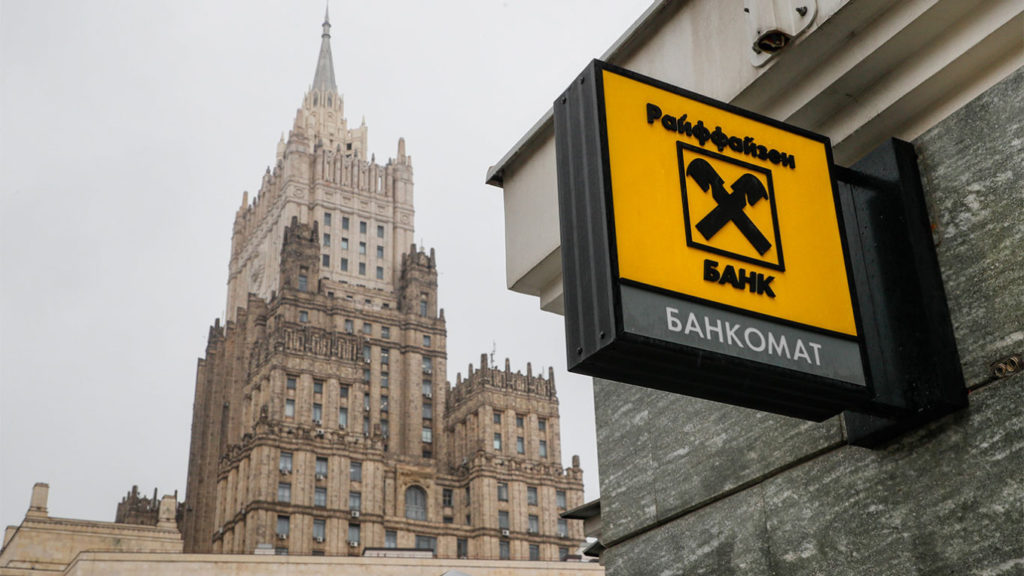 A logo of the Raiffeisen bank in front of the Russian Ministry of Foreign Affairs in Moscow. File photo: TASS