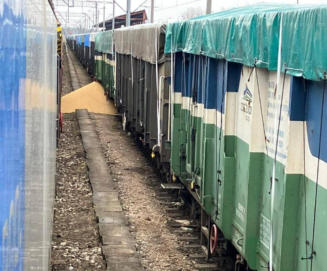 damaged train with Ukrainian agricultural products at Polish railway station