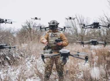 A Ukrainian soldier and drones