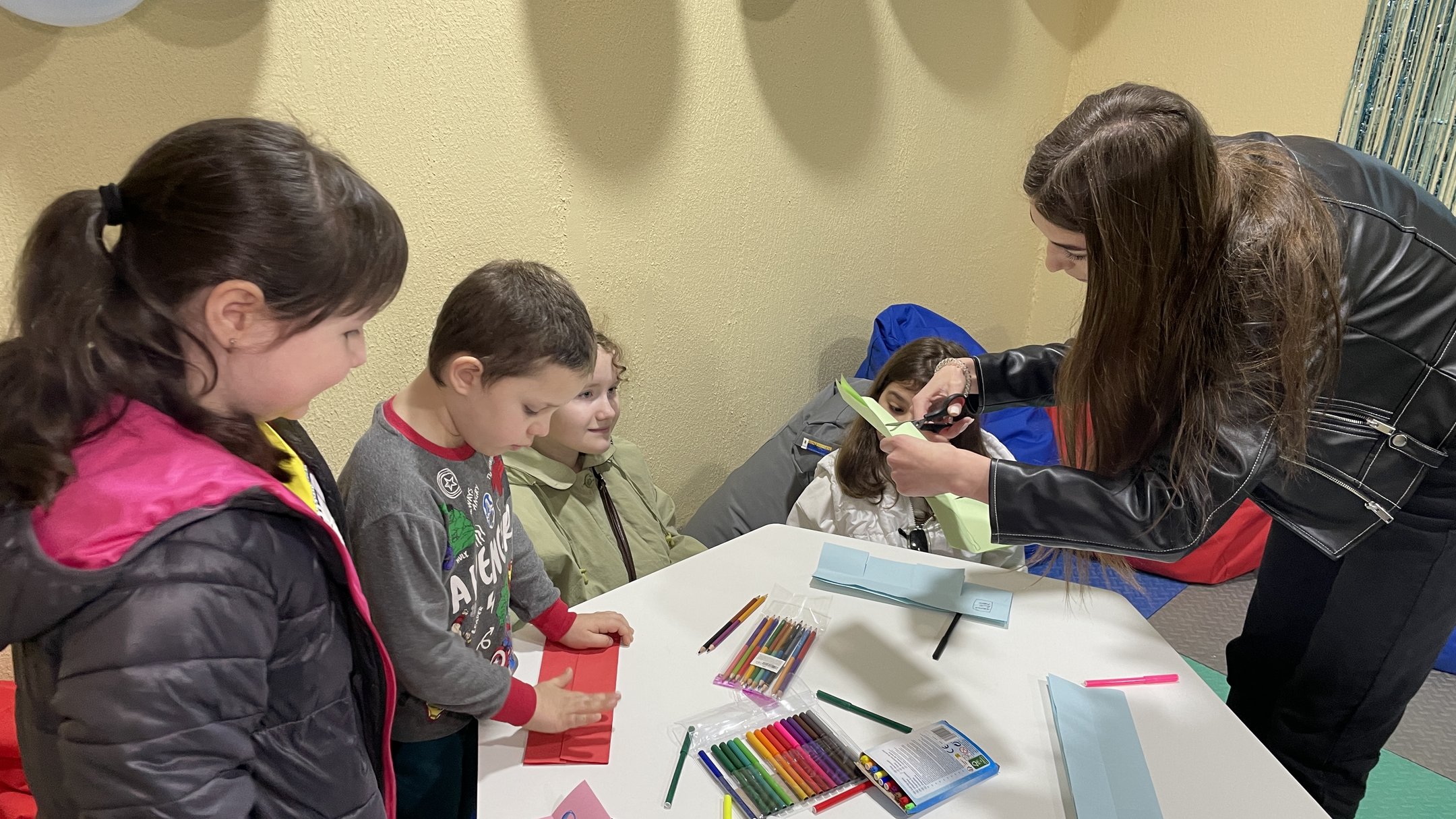 The image shows children at the Book Shelter in Kherson. Source: Suspilne 