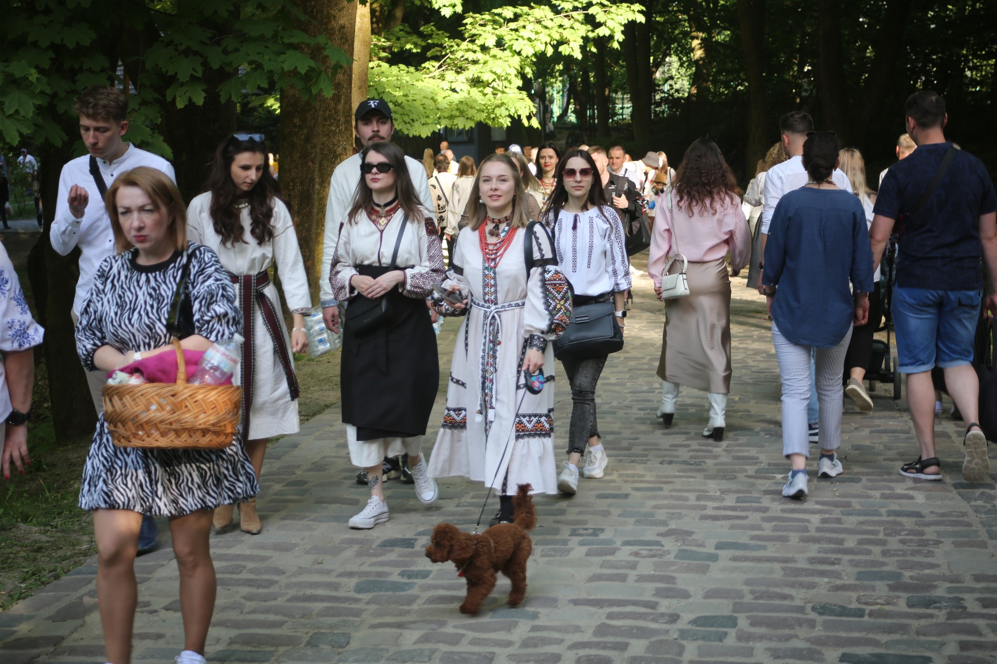 Shevchenko Grove Museum Easter festival woman pet dog Lviv embroidered shirt 2024