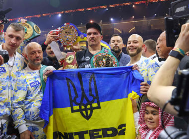 Ukraine's Oleksandr Usyk (C) celebrates his victory over Britain's Tyson Fury during a heavyweight boxing world championship fight at Kingdom Arena in Riyadh, Saudi Arabia on May 19, 2024