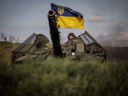 Ukrainian soldier in tank T-64
