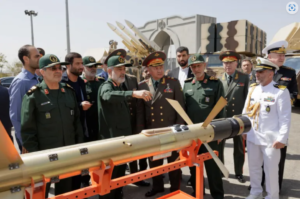 IRGC aerospace chief Hajizadeh showed Russian Security Council Secretary Sergey Shoigu an array of Iranian arms, including the Shahed-136 kamikaze drone in 2023. Photo: Russian Defense Ministry