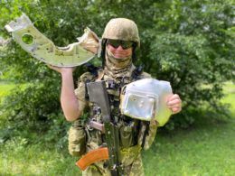 Ukrainian soldier Serhii is holding fragments of a Russian missile. Source: Ukraine's Air Force