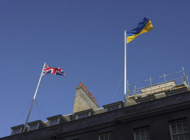 ukrainian flag flies over uk pm's office downing street 25 february 2022 day after russia started its full-scale invasion ukraine / 10 simon dawson solidarity people following russia's