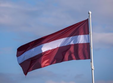 Latvian flag, illustrative image. Photo via Eastnews.ua.