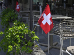Swiss flag, illustrative image. Photo via Eastnews.ua.