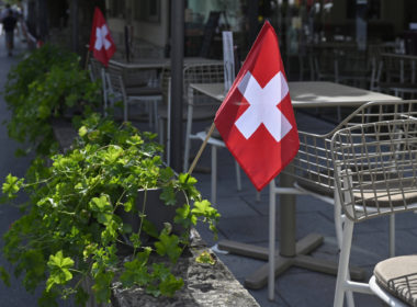 Swiss flag, illustrative image. Photo via Eastnews.ua.