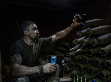 A Ukrainian soldier prepares 155mm artillery shells in his fighting position. Illustrative image, photo via Eastnews.ua.