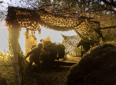 Ukrainian soldier firing artillery, illustrative image. Photo via Eastnews.ua.