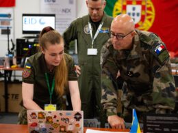 Ukrainian and NATO defense officials at the presentation of the DELTA combat system. Photo via Ukraine's Ministry of Defense.