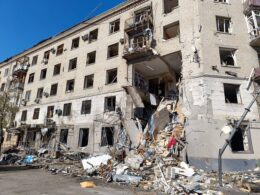 damaged residential building in Kharkiv,