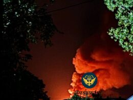 A fire from the detonations at an ammunition storage site in Voronezh Oblast, Russia.