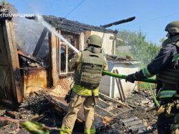 Ukrainian rescuers extinguishing the fire in Zhytomyr Oblast after Russian massive attack on Ukraine.