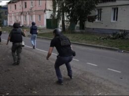 Journalists in Sudzha, Kursk Oblast.