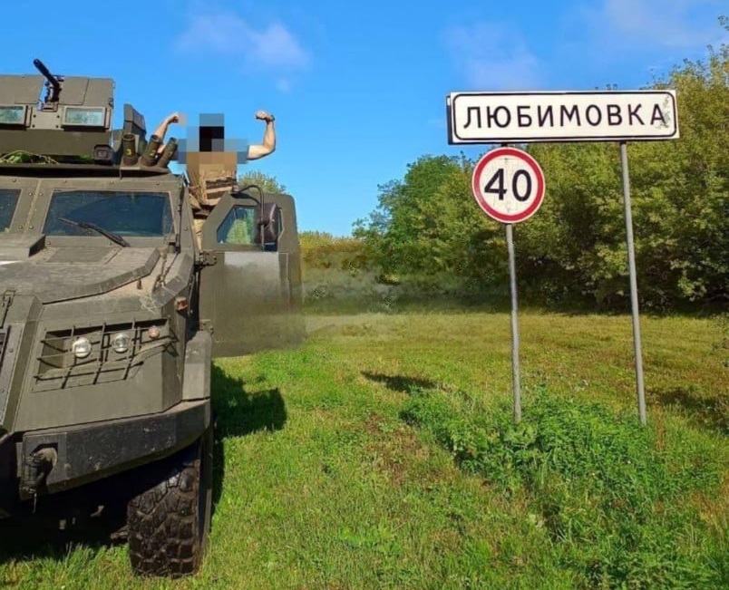 sumy sees fewer russian attacks from contested kursk more belgorod data shows ukrainian soldier posing near entrance sign lyubimovka oblast russia august 2024 military kursk-1