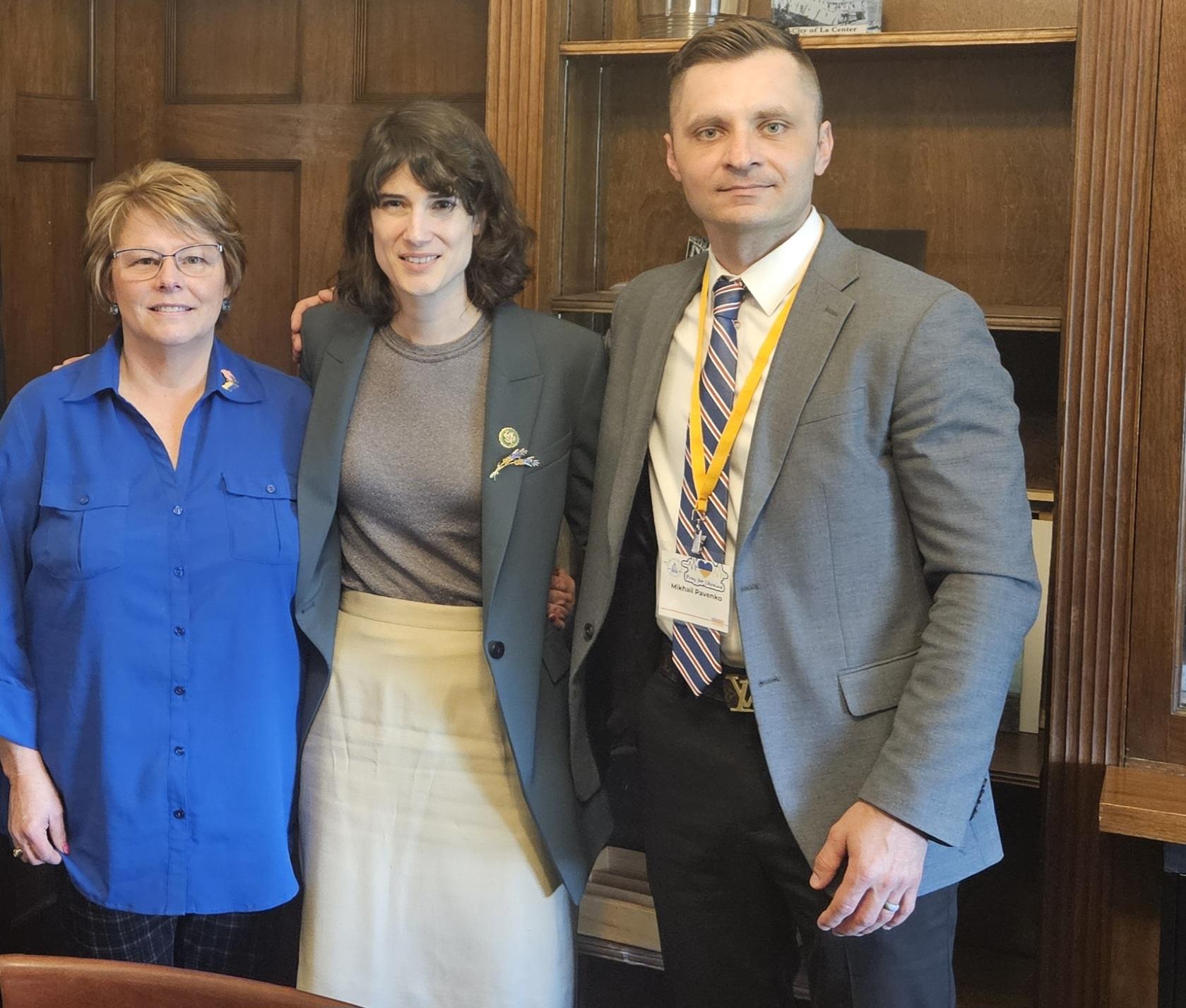 Democrat Congresswoman Marie Gluesenkamp Perez with Ukrainian American Mikhail Pavenko and Karla Webber, whose son Andrew fell defending Ukraine. Photo: Mikhail Pavenko. Ukrainian Maericans US election 2024 Trump Harris Biden