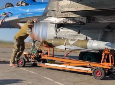 australia donates retired jdam-er precision bombs ukraine ukrainian soldier attaches american gbu-62 under wing air force mig-29