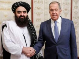 isw russia moves closer delisting taliban terrorist organizations afghanistan's acting foreign minister amir khan muttaqi (left) meets russian counterpart sergei lavrov (right) moscow 4 2024 left shakes hands establishes legal