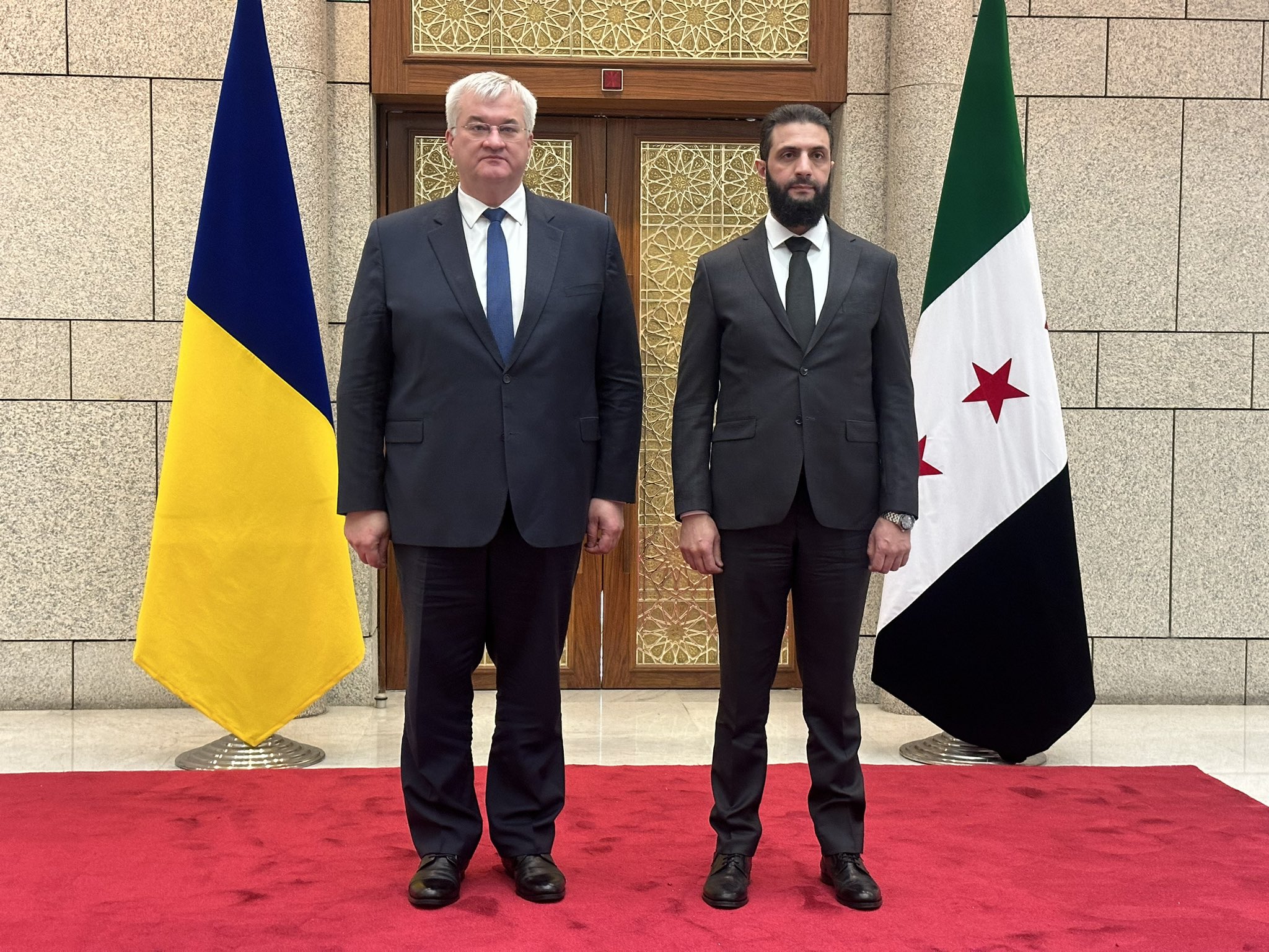 Ukraine's Foreign Minister Andrii Sybiha and Syria's acting leader Ahmed al-Sharaa in Damascus. 30 December 2024.