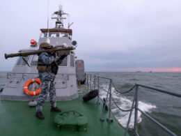 A Ukrainian serviceman on a vessel, illustrative image. Photo via Eastnews.ua.