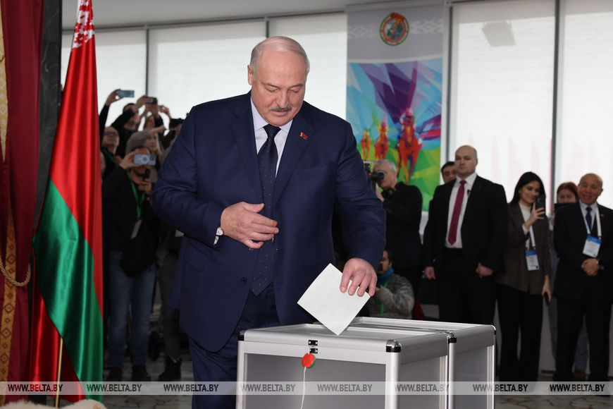 Self-proclaimed Belarusian president Alexander Lukashenko is casting a ballot during a presidential election in 2025, characterized as "sham" and "farce" by international audience.