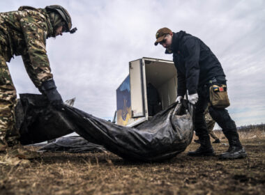 DONETSK OBLAST, UKRAINE - FEBRUARY 24: Volunteers of a group called Black Tulip prepare to examine personal belongings of two Russian soldiers whose bodies were collected on the second anniversary of Russia-Ukraine war in Donetsk Oblast, Ukraine on February 24, 2024.