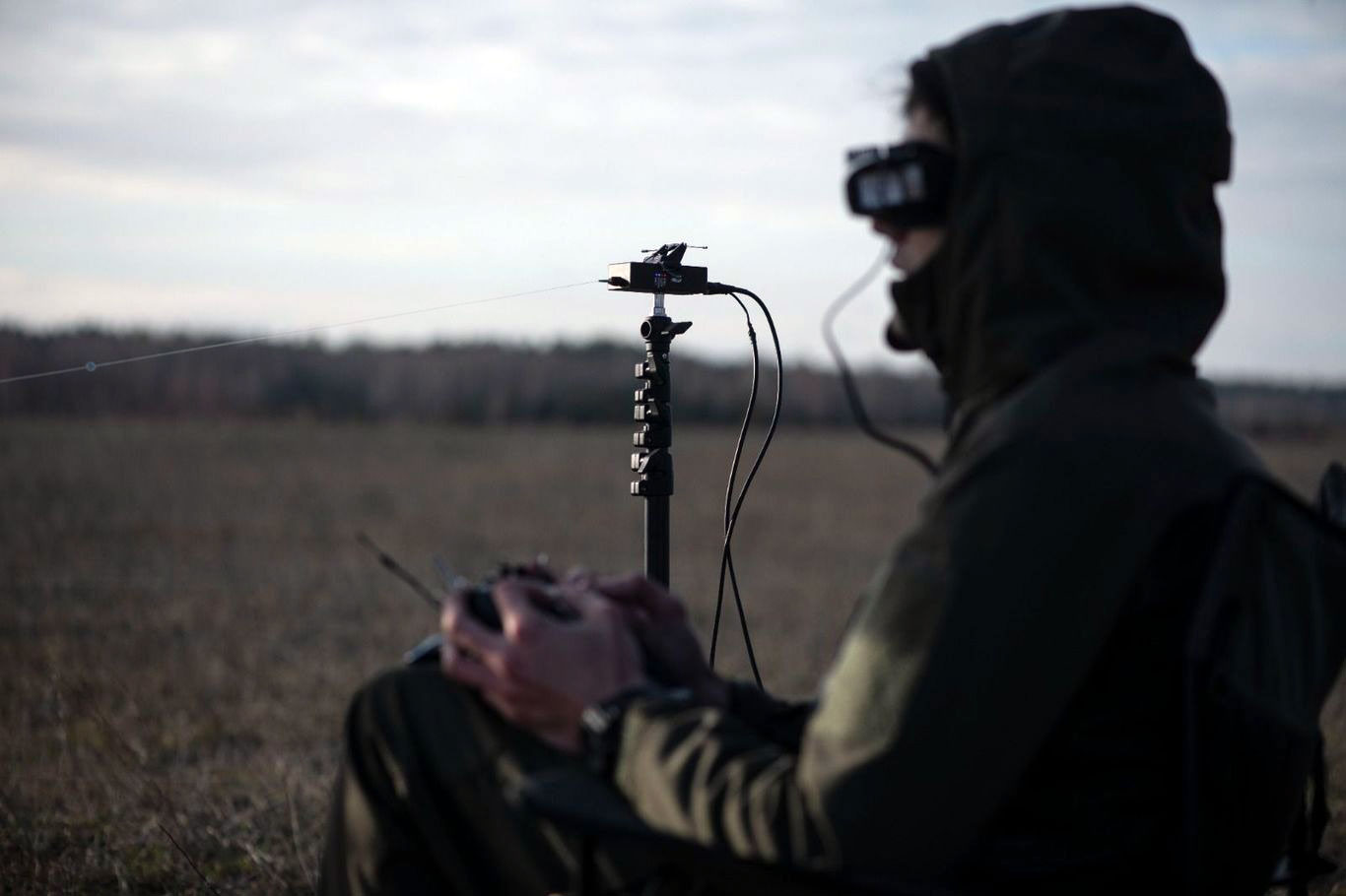 ukraine's defense ministry showcases fiber optic-controlled fpv drones pilot ukrainian drone controlled optic cable 2025 fiber-optic-fpv-drone-operator-pilot ukraine news reports