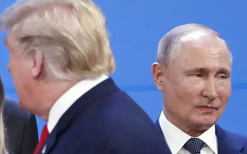 U.S. President Donald Trump (left) and Russia's ruler Vladimir Putin (right)/ AP PHOTO