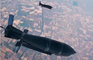 Glide bombs drop away from a Russian jet.