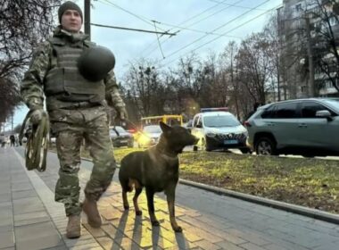 Ukrainian policeman with a dog