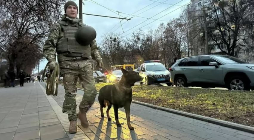 Ukrainian policeman with a dog