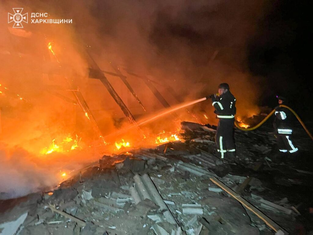 Ukrainian rescuers are extinguishing fire after the Russian attack on Kharkiv Oblast on 24 March 2025.