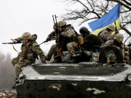 Ukrainian soldiers/ Kyodo via AP Images