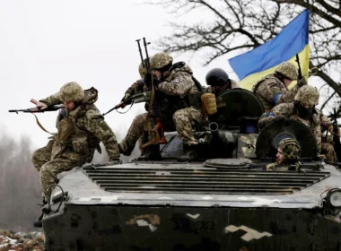 Ukrainian soldiers/ Kyodo via AP Images