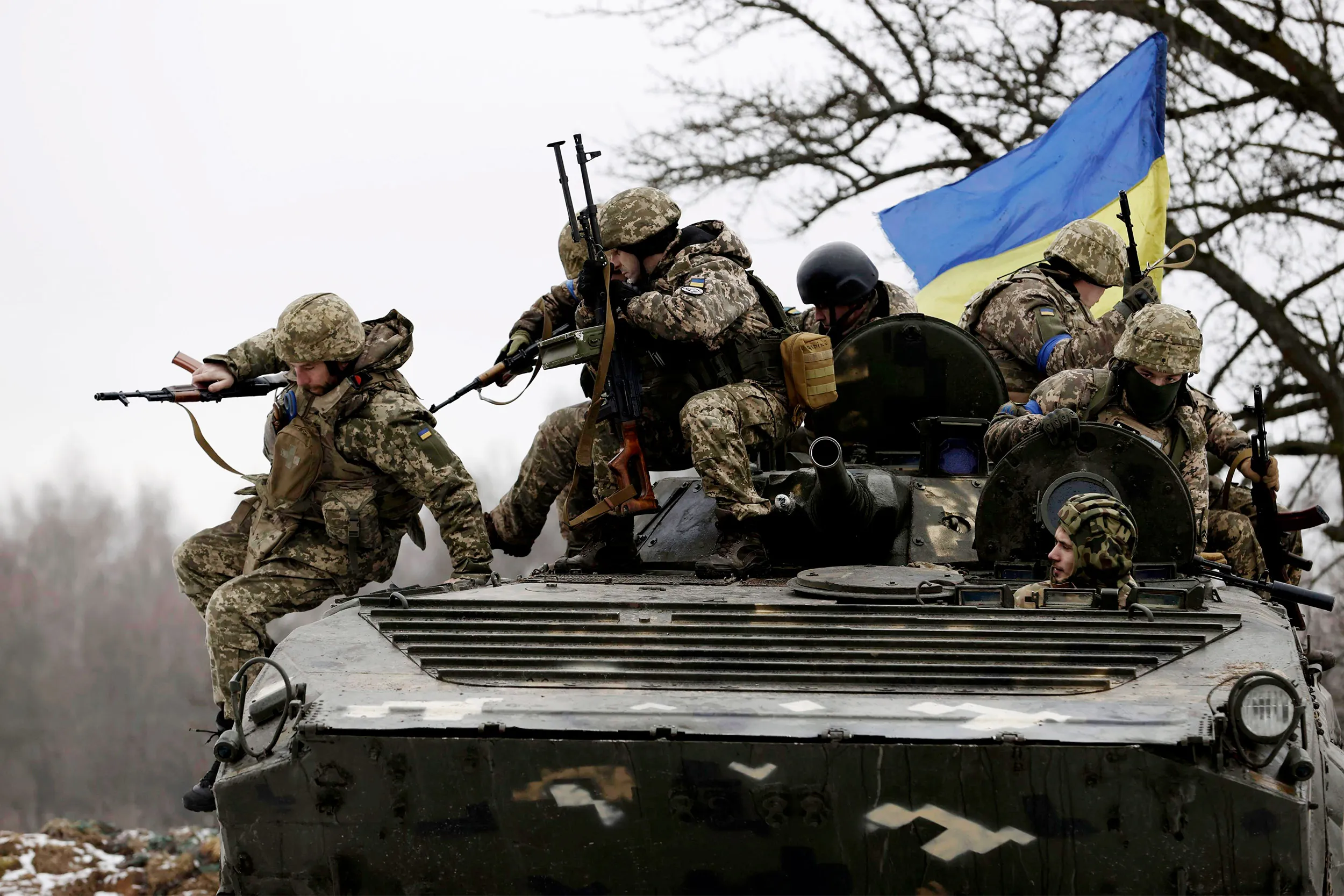 Ukrainian soldiers/ Kyodo via AP Images