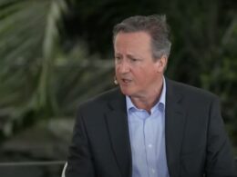 trump's ukraine stance worrying russia's neighbors says david cameron converge live singapore 13 2025 former uk prime minister expressed concern president donald approach securing peace could establish dangerous precedent other